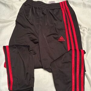 Boys Adidas joggers. Black with red stripes, worn size 7.